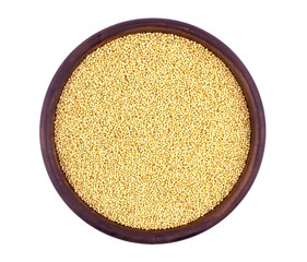 Amaranth grain in ceramic bowl isolated on a white background.