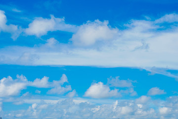 Blue sky and white clouds background.