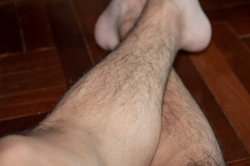 Men legs with thick hair
