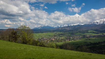 Fototapeta na wymiar View from Harenda on the snowy Tatra Mountains on a spring morning, Zakopane, Poland