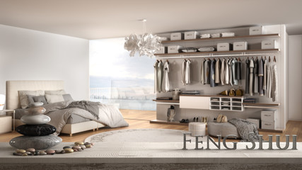 Vintage wooden table shelf with pebble balance and 3d letters making the word feng shui over modern white and wooden bedroom in contemporary apartment, zen concept interior design