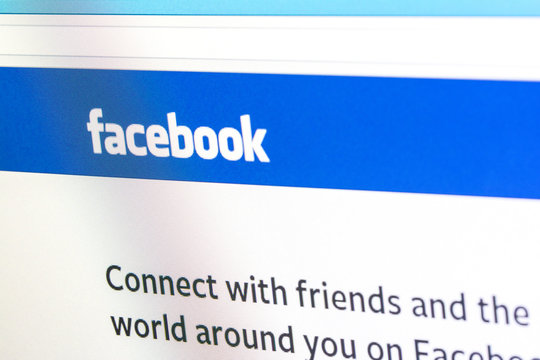 BUCHAREST, ROMANIA - JUNE 21, 2014: Facebook Website On Personal Computer Desktop. Founded in 2004 Facebook is an online social networking service with more than 1.3 billion users worldwide.