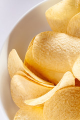 typical crisps in a white bowl