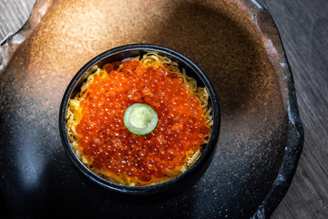 Ikura Don with wasabi on top in the Japanese restaurant