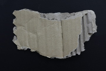 ripped paper isolated on black background