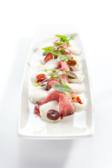 Beef vitello tonnato platter closeup