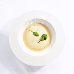 Cream soup with boletus forest mushrooms top view