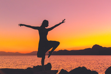 Silhouette of a girl by the sea