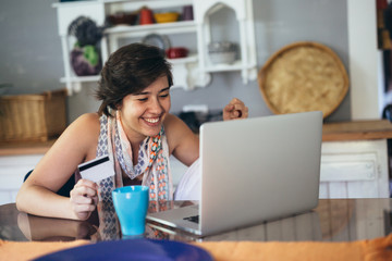 woman online shopping from her home