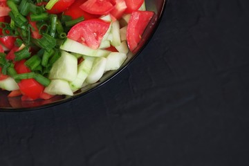 cucumber and tomatoes with copy space