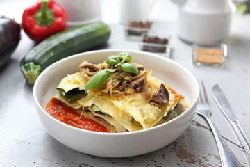 Vegetable lasagne with sweet chilli sauce. Vegetables layered with corn flakes