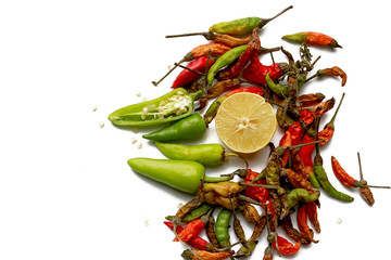 red and green dried chilies with fresh chilies isolated on white background 