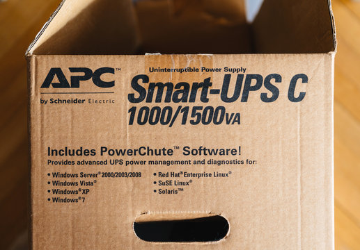 PARIS, FRANCE - MAR 29, 2018: Detail of the open box of APC Smart-UPS C 1000VA LCD 230V enterprise-level uninterruptible power supplies made by American Power Conversion