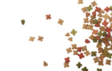 Pet food, granules isolated on white background, top view