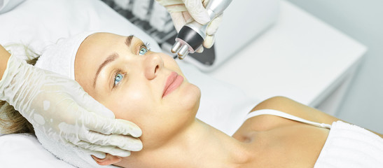 Dermatology skin care facial therapy. Medical spa anto wrinkles procedure. Woman face rejuvenation....