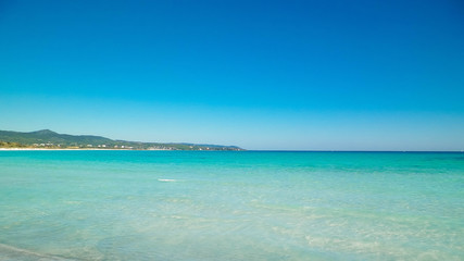 Blue water of Tyrrhenian sea in Vada, Tuscany, Italy.