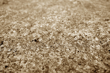 Marble stone background with blur effect in brown tone.