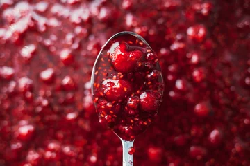 Foto op Plexiglas raspberry jam is kept with a metal spoon, shallow depth of field © zadveri