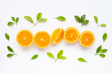 High vitamin C. Fresh orange citrus fruit with leaves isolated on white.
