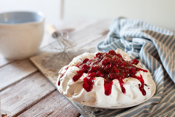 Delicious Pavlova cake with cherry