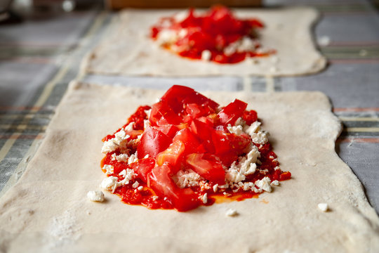 Tomato filling with cheese and red chili pepper sauce for buritos.
