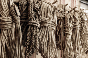 handcraft ship ropes hang on wooden wall © MIGUEL GARCIA SAAVED
