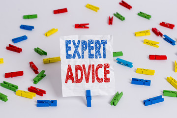 Text sign showing Expert Advice. Business photo showcasing Sage Good Word Professional opinion Extensive skill Ace Colored clothespin papers empty reminder white floor background office