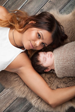 New mum and infant in newborn portrait