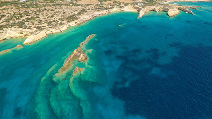 Aerial drone photo of Laki paradise beach with beautiful emerald and turquoise sea and small volcanic bays, Kato Koufonisi, Small Cyclades, Greece