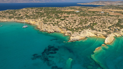 Aerial drone photo of Laki paradise beach with beautiful emerald and turquoise sea and small volcanic bays, Kato Koufonisi, Small Cyclades, Greece