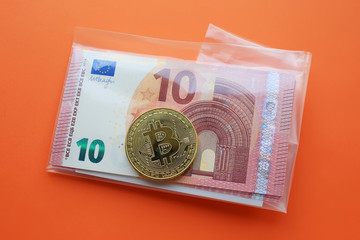 Bitcoin cryptocurrency and euro background. Concept with bitcoin.