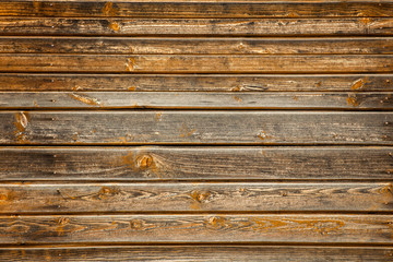 Fototapeta premium old wooden planks with a brown background