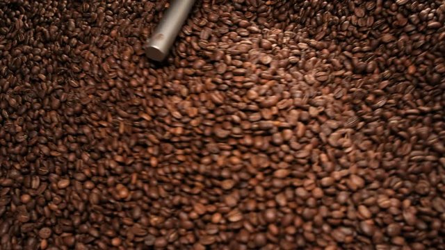 Top View Coffee Roasting Process - Coffee beans in large roasting machine