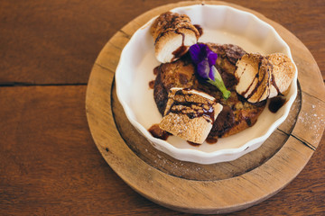 cookie with toast Marshmallow on wooden table in cafe