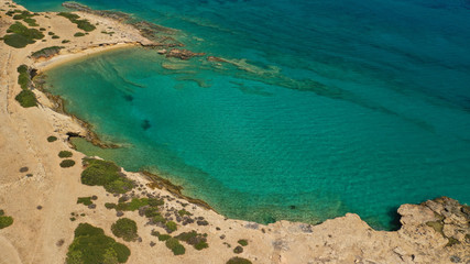 Aerial drone photo of turquoise paradise beaches of Kato Koufonisi island main Chora and church of Panagia, Small Cyclades, Greece