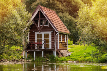 Small wooden house near the lake