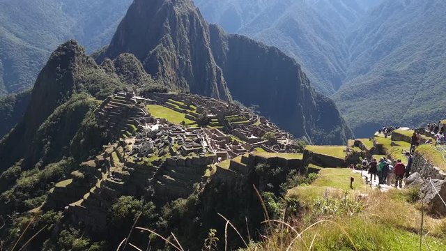 Macchu Picchu, Peru - July 27, 2019: View over the ruins at Machu Picchu
