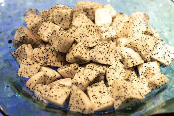 Dragon fruit, also known as pitahaya or strawberry pear, is a tropical fruit. Sliced dragon fruit...