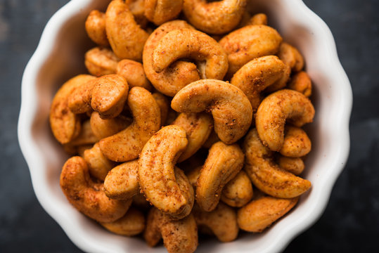Masala Kaju or spicy Cashew in a bowl. Popular festival snack from India/asia, also known as Chakna recipe