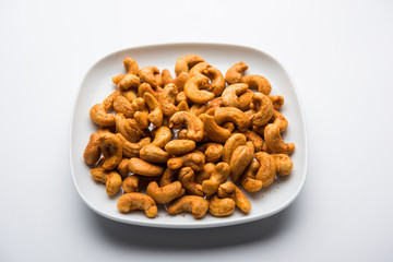 Masala Kaju or spicy Cashew in a bowl. Popular festival snack from India/asia, also known as Chakna recipe