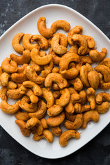 Masala Kaju or spicy Cashew in a bowl. Popular festival snack from India/asia, also known as Chakna recipe