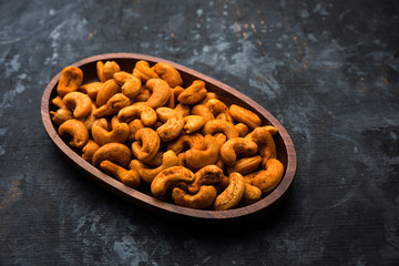 Masala Kaju or spicy Cashew in a bowl. Popular festival snack from India/asia, also known as Chakna recipe