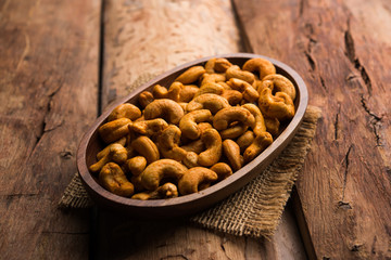 Masala Kaju or spicy Cashew in a bowl. Popular festival snack from India/asia, also known as Chakna recipe