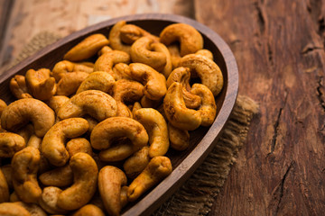 Masala Kaju or spicy Cashew in a bowl. Popular festival snack from India/asia, also known as Chakna recipe