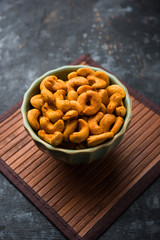 Masala Kaju or spicy Cashew in a bowl. Popular festival snack from India/asia, also known as Chakna recipe