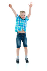 Little boy jumping.The concept of a happy childhood, sports and