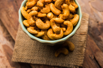 Masala Kaju or spicy Cashew in a bowl. Popular festival snack from India/asia, also known as Chakna recipe