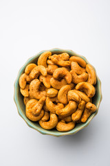 Masala Kaju or spicy Cashew in a bowl. Popular festival snack from India/asia, also known as Chakna recipe