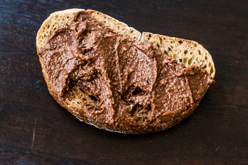Homemade Cream Chocolate Hazelnut Spread with Bread Slice.