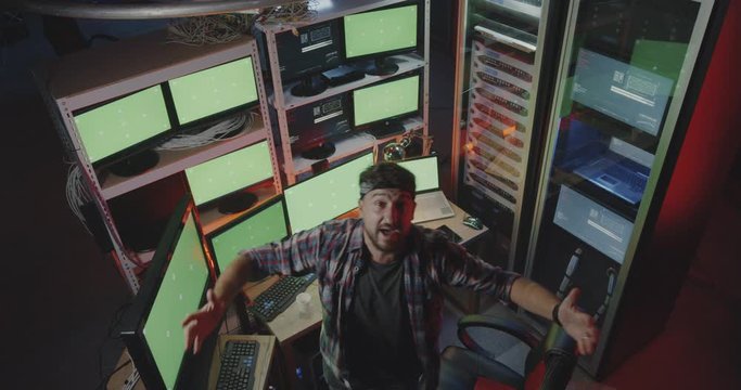 Hacker complaining into camera